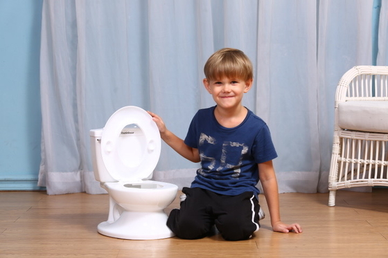 Ouninbear Potty d'entraînement en plastique blanc avec bouton de poignée pour bébés