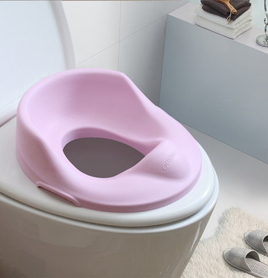 Les sièges de la piscine pour enfants sont doux, avec un motif solide en gris/rose/bleu.