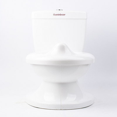 Modèle solide Blanc bleu rose Potty d'entraînement de bébé EN71 Certification d'essai avec son de rinçage