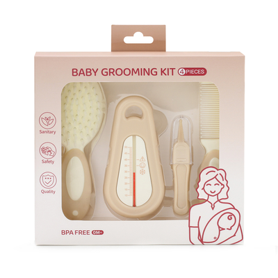 Une brosse douce pour bébé, un thermomètre pour l' eau de bain, pour les soins de la tête des nouveau-nés.
