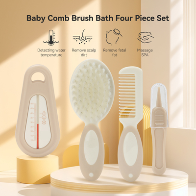 Une brosse douce pour bébé, un thermomètre pour l' eau de bain, pour les soins de la tête des nouveau-nés.